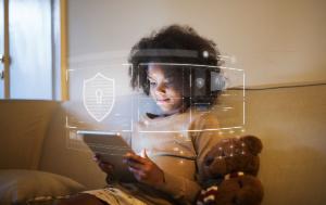 A minor using a tablet